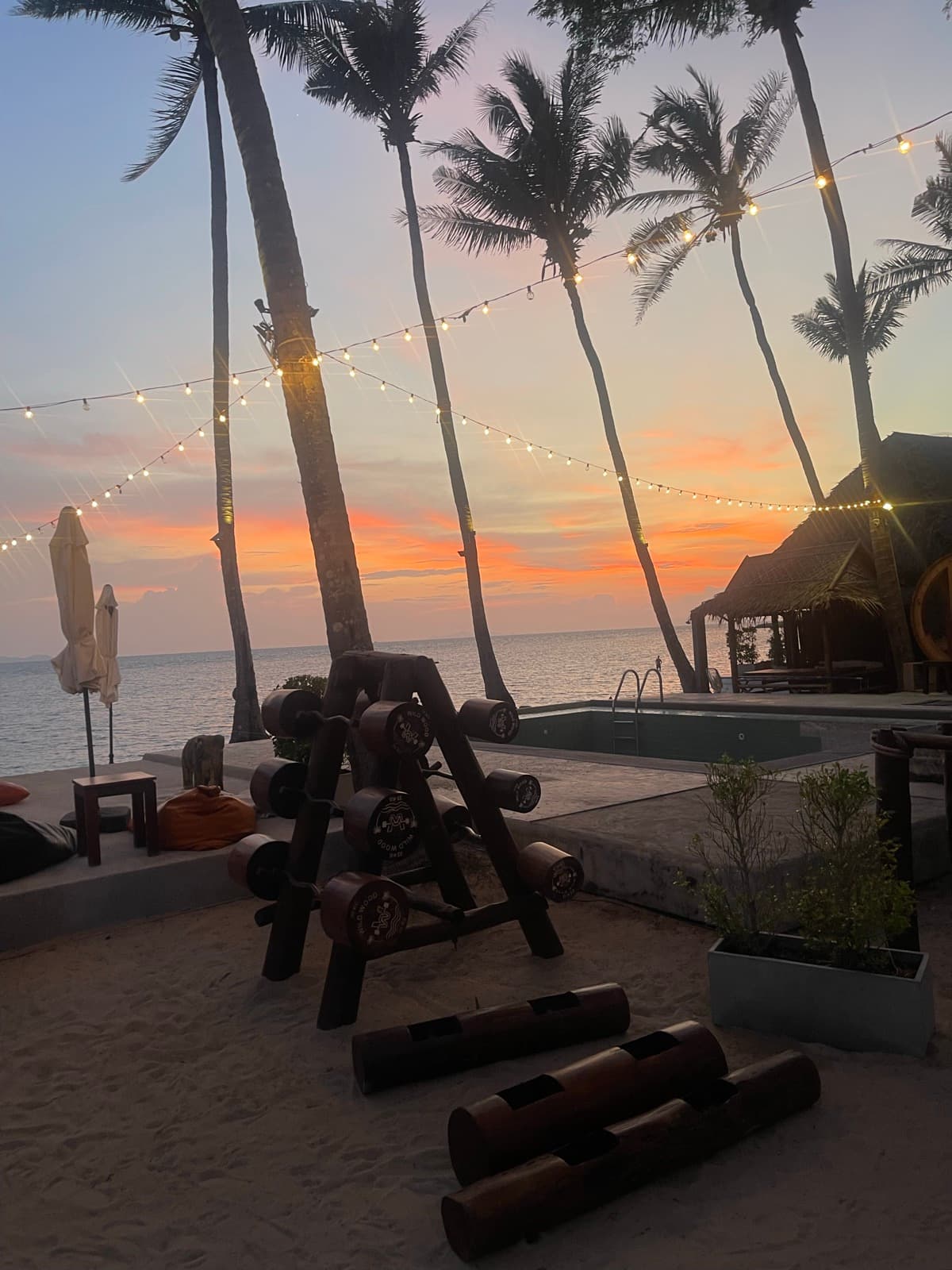 Outdoor gym on a beach at sunset